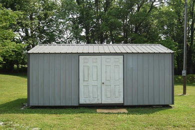 This is a 3-bedroom 3-bath house that was once a gunsmithing