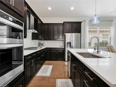 This highly upgraded 2BR + den villa in Azure at Hacienda Lakes - photo 4