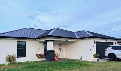 Remodeled and move-in ready, this beautiful Cape Coral home - photo 1