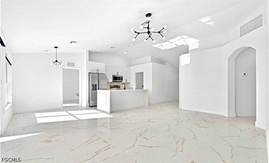 Remodeled and move-in ready, this beautiful Cape Coral home - photo 3