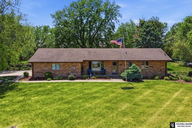 ACREAGE LIVING without leaving Lincoln! This rare 1+ acre
