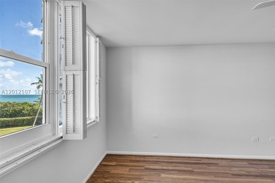 A Rare Beachfront Setting with Direct Ocean Views This - photo 14