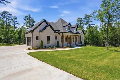 Nestled on a beautifully private homesite in the highly - photo 5