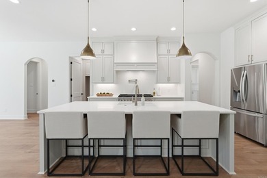 Nestled on a beautifully private homesite in the highly - photo 10