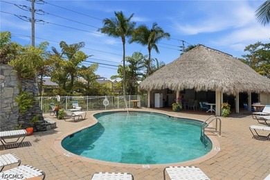 Do not miss this beautifully maintained first-floor condo in the - photo 1
