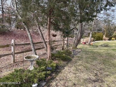 THIS FINE HOME SAYS ''WELCOME'' FROM THE OPEN PORCH INTO THE - photo 3