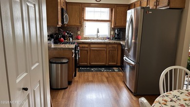 THIS FINE HOME SAYS ''WELCOME'' FROM THE OPEN PORCH INTO THE - photo 5