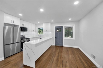 Welcome to 1052 East 227th street! This stunning fully renovated - photo 1
