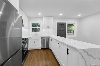 Welcome to 1052 East 227th street! This stunning fully renovated - photo 2