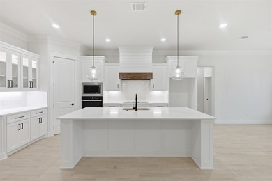 New construction by Al Couto Homes in the gated golf course - photo 10