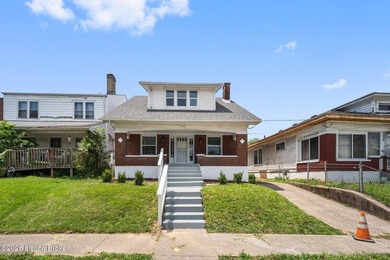 Completely renovated and move in ready! This charming brick - photo 3