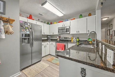 Welcome home to this beautifully updated 2-bedroom, 2-bath - photo 9