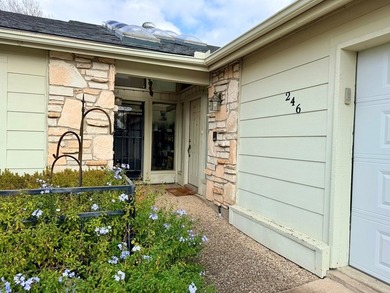 Location, Location, Location! This beautiful garden home is - photo 2
