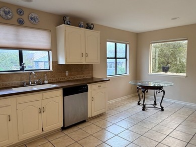 Location, Location, Location! This beautiful garden home is - photo 9