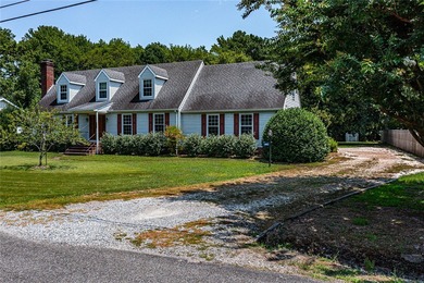 3 Bedroom (with bonus room), 2.5 Bath charming Cape cod nestled