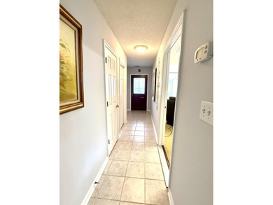 Welcome to this 3 BR/2 BA end unit on a corner cul-de-sac lot