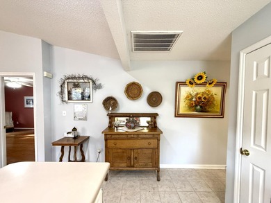 Welcome to this 3 BR/2 BA end unit on a corner cul-de-sac lot