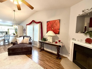 Welcome to this 3 BR/2 BA end unit on a corner cul-de-sac lot