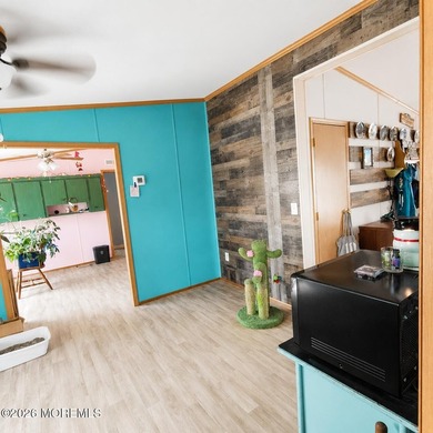 Welcome to this well-maintained 4-bedroom, 2-full-bath home in - photo 7