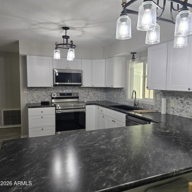 ON LEASED LAND: This home is absolutely gorgeous!! It has been - photo 2