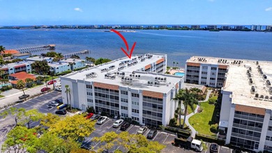 Experience sophisticated coastal living in this exquisitely - photo 1