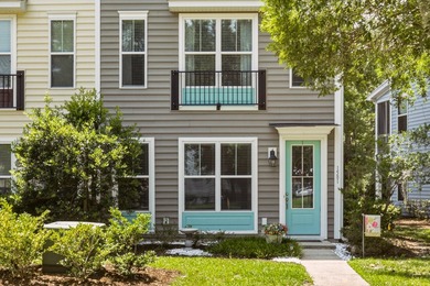Welcome to this sophisticated and coveted end-unit townhome in - photo 2
