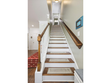 Welcome to this sophisticated and coveted end-unit townhome in - photo 7