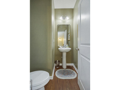 Welcome to this sophisticated and coveted end-unit townhome in - photo 8