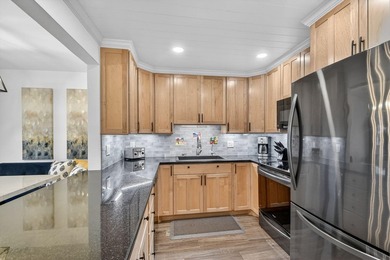 Experience sophisticated coastal living in this exquisitely - photo 9
