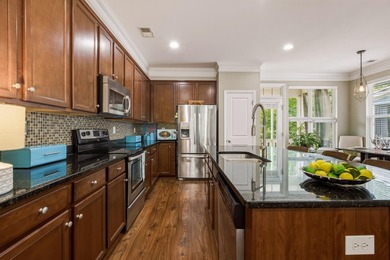 Welcome to this sophisticated and coveted end-unit townhome in - photo 10