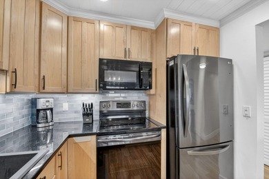 Experience sophisticated coastal living in this exquisitely - photo 10