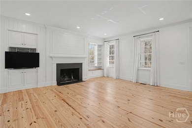 Located within the prestigious Ford Field and River Club in the - photo 11