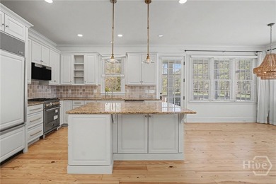 Located within the prestigious Ford Field and River Club in the - photo 12