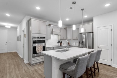 Beautiful 4-bedroom, 3.5-bath townhome located in the highly - photo 5