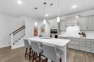 Beautiful 4-bedroom, 3.5-bath townhome located in the highly - photo 8