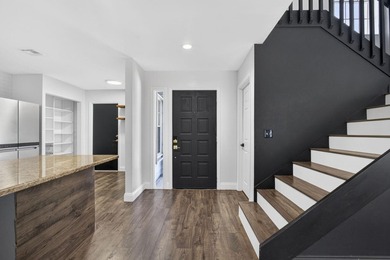Spacious townhouse with Brand New Roof, newer plumbing, and new - photo 6