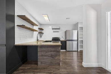 Spacious townhouse with Brand New Roof, newer plumbing, and new - photo 7