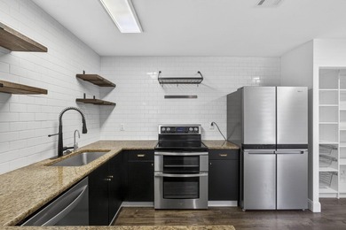 Spacious townhouse with Brand New Roof, newer plumbing, and new - photo 8