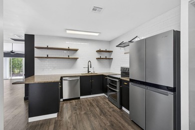 Spacious townhouse with Brand New Roof, newer plumbing, and new - photo 9
