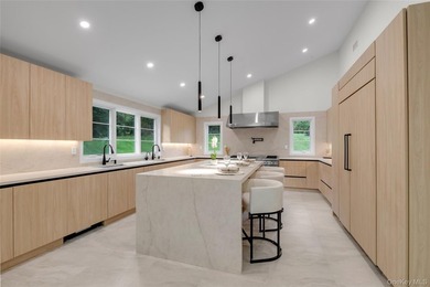 A rare opportunity to own a stunning fully gutted expanded - photo 8