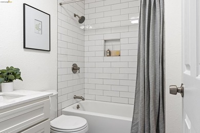 Top floor sun-splashed 2 Bedroom and 1 bath updated condo is - photo 14