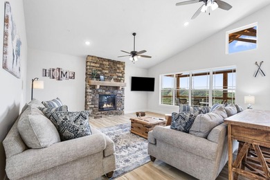 Crowne comfort! This 7-bedroom, 9-bathroom lodge comes fully - photo 2