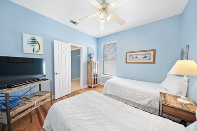 Located in the gated, Gulf-side community of Emerald Waters - photo 29