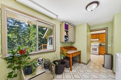 Perched among the trees on 3.24 private acres, this inviting - photo 24