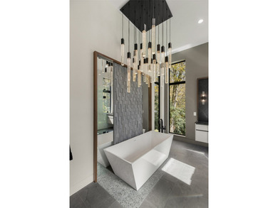 This newly constructed home redefines luxury mountain living - photo 38