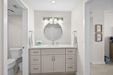 Indulge in luxury coastal living with this bright and - photo 23