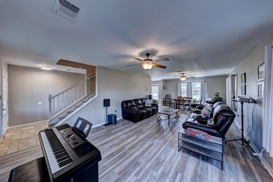 Welcome to this spacious and inviting 4-bedroom, 2.5-bathroom