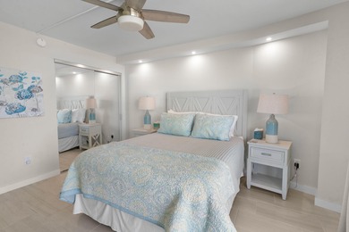 Indulge in luxury coastal living with this bright and - photo 27