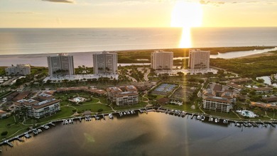 Indulge in luxury coastal living with this bright and - photo 47