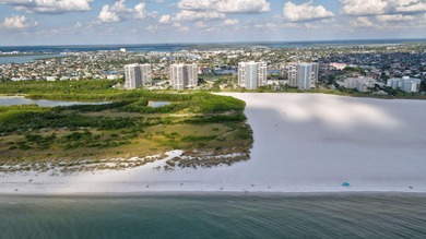 Indulge in luxury coastal living with this bright and - photo 49